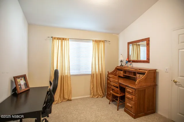 a room with furniture and a window