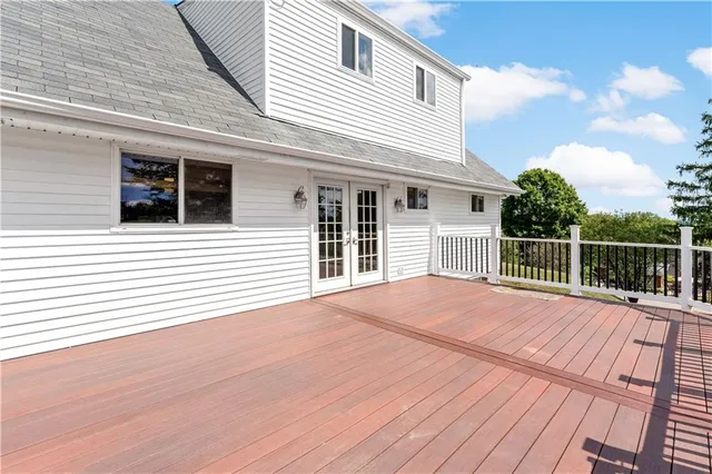 a view of a house with a roof deck