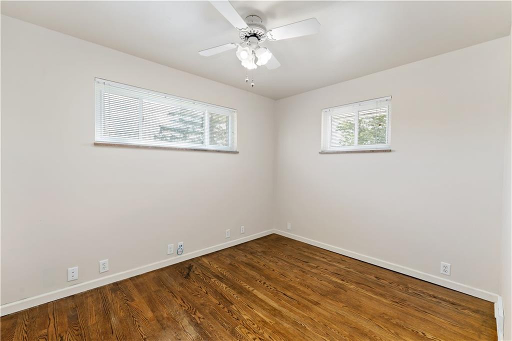 225 Larson Boulevard Rostraver Township, PA 15012 - Photo 21 of 46 an empty room with a fan & a ceiling fan