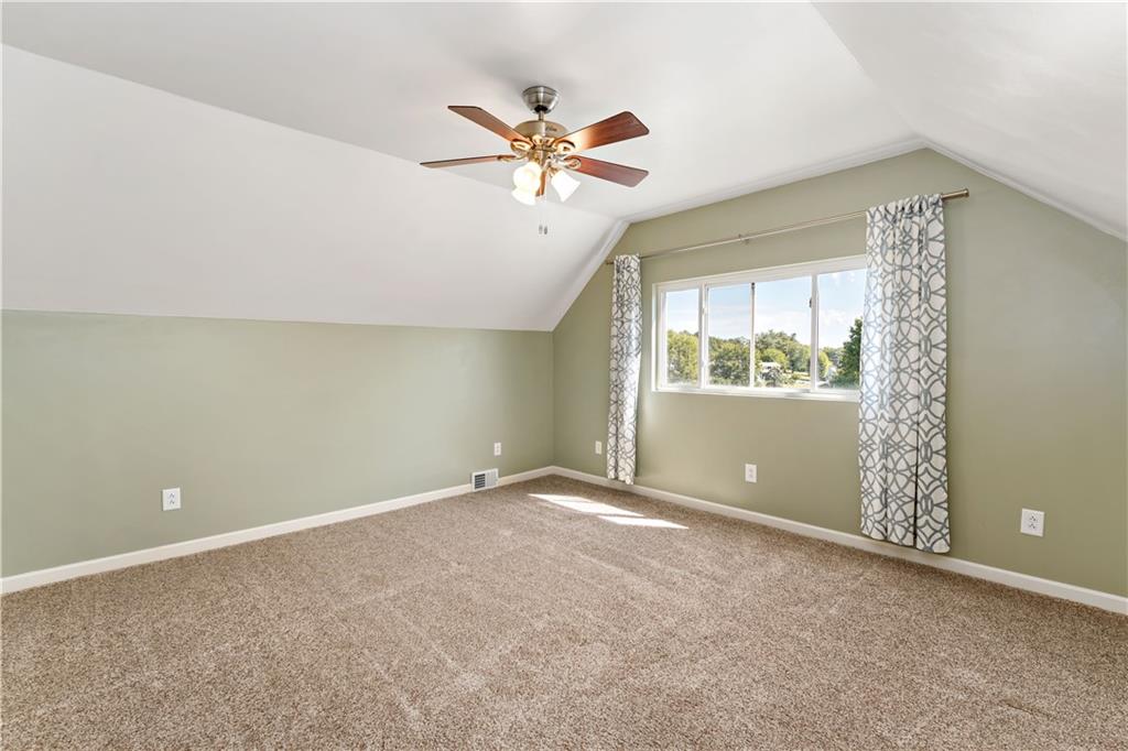 225 Larson Boulevard Rostraver Township, PA 15012 - Photo 22 of 46 an empty room with windows and fan