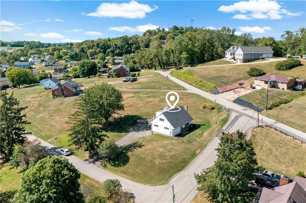 225 Larson Boulevard Rostraver Township, PA 15012 - Photo 40 of 46 an aerial view of a house with yard swimming pool and outdoor seating