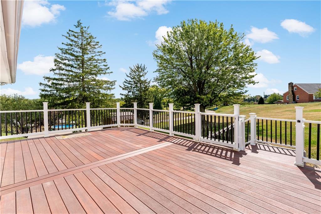 225 Larson Boulevard Rostraver Township, PA 15012 - Photo 4 of 46 a view of a wooden deck