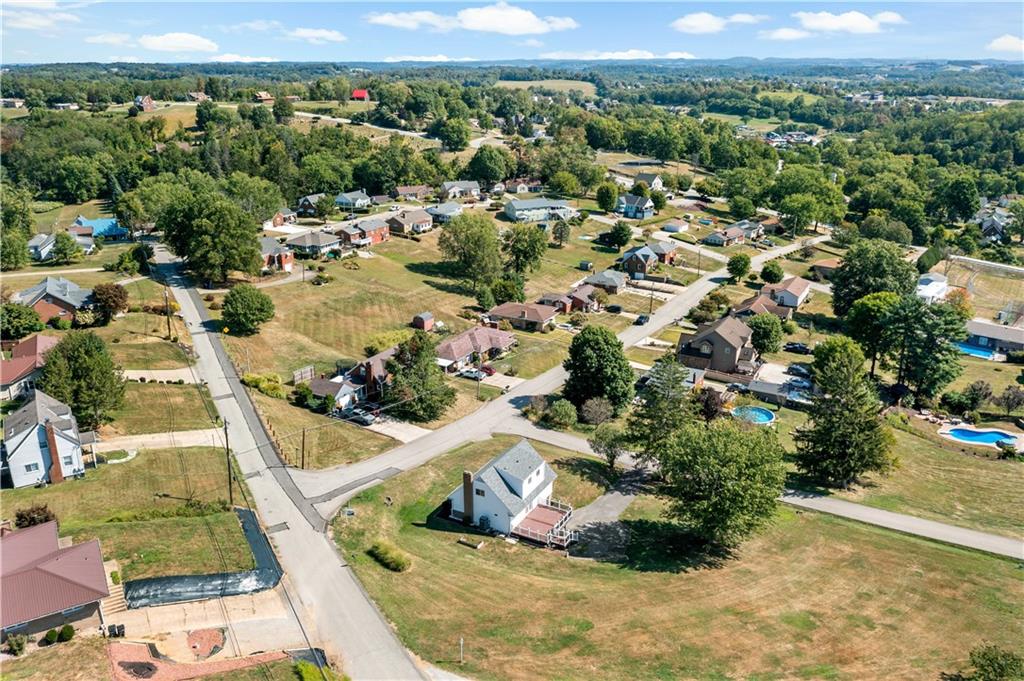 225 Larson Boulevard Rostraver Township, PA 15012 - Photo 43 of 46 an aerial view of a house with a yard