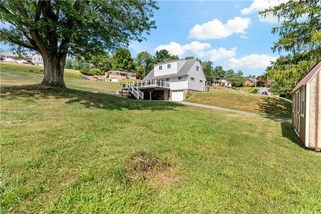 225 Larson Boulevard Rostraver Township, PA 15012 - Photo 46 of 46 a view of a house with a big yard