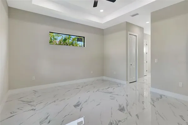 a bathroom with a double vanity sink mirror and shower