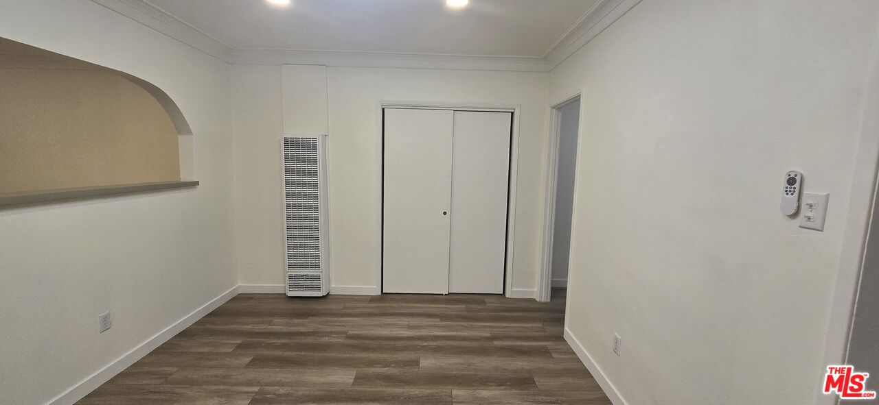 4828 3rd Avenue Los Angeles, CA 90043 - Photo 6 of 15 a view of a room with wooden floor