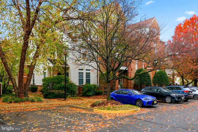 a view of street with parked cars