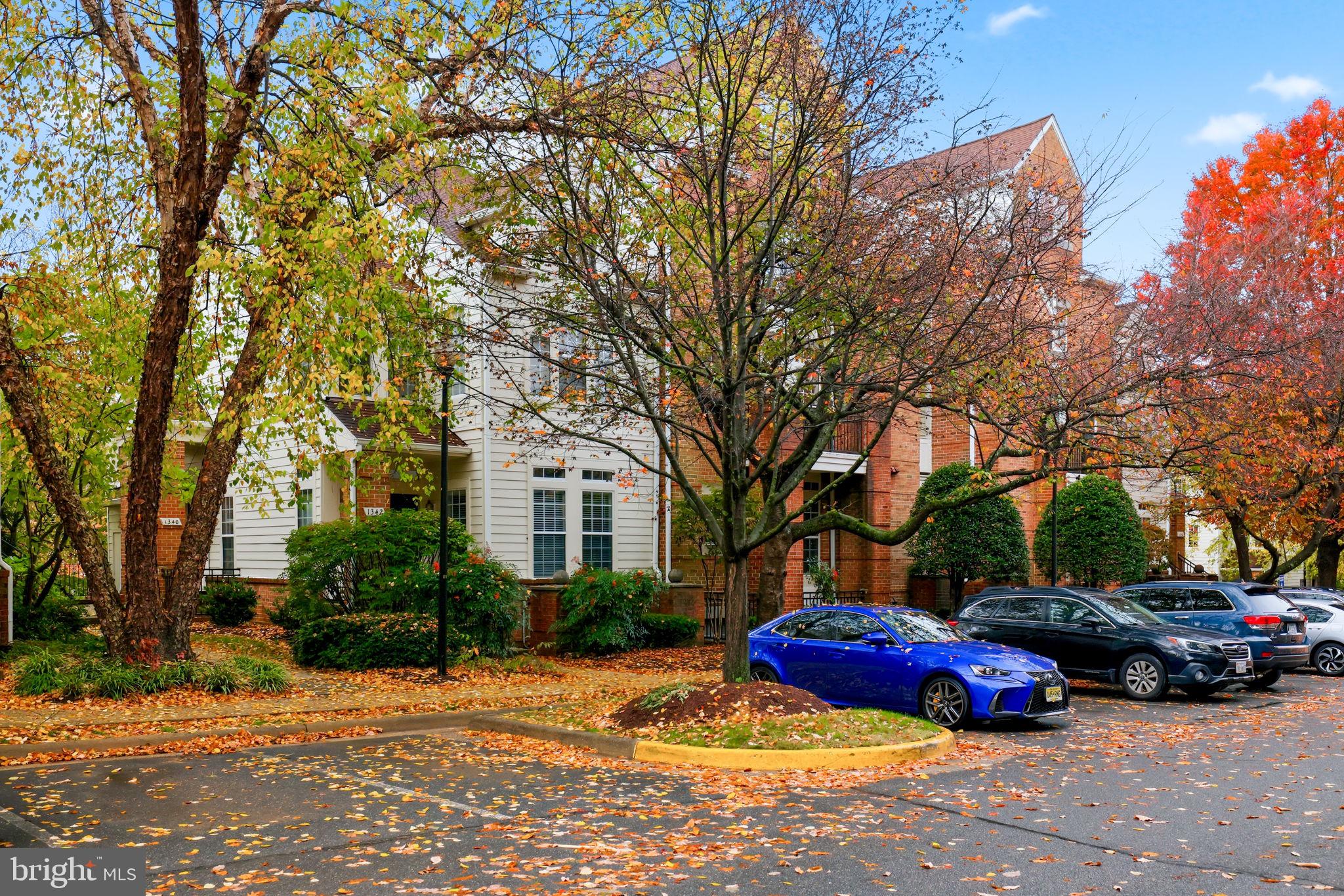 a view of street with parked cars