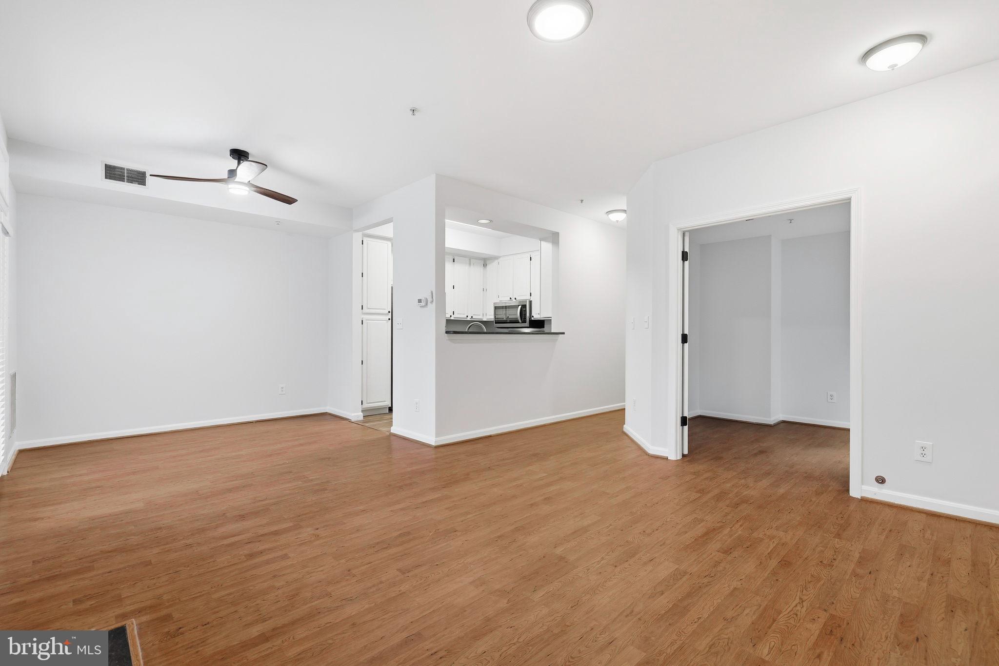 1340 Garden Wall Circle, Unit 502 Reston, VA 20194 - Photo 12 of 32 a view of a kitchen with a sink and a refrigerator