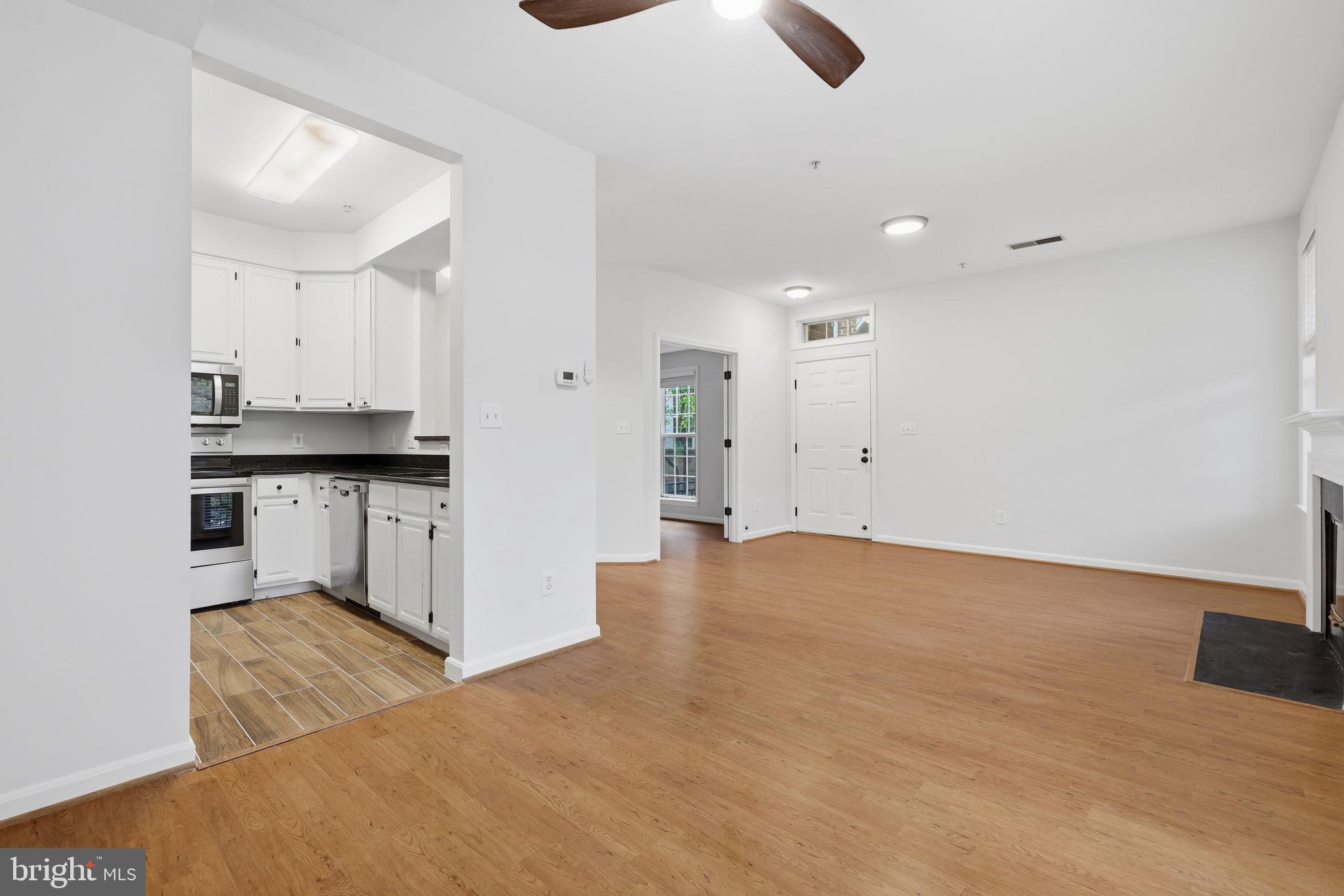 1340 Garden Wall Circle, Unit 502 Reston, VA 20194 - Photo 14 of 32 a view of kitchen and empty room