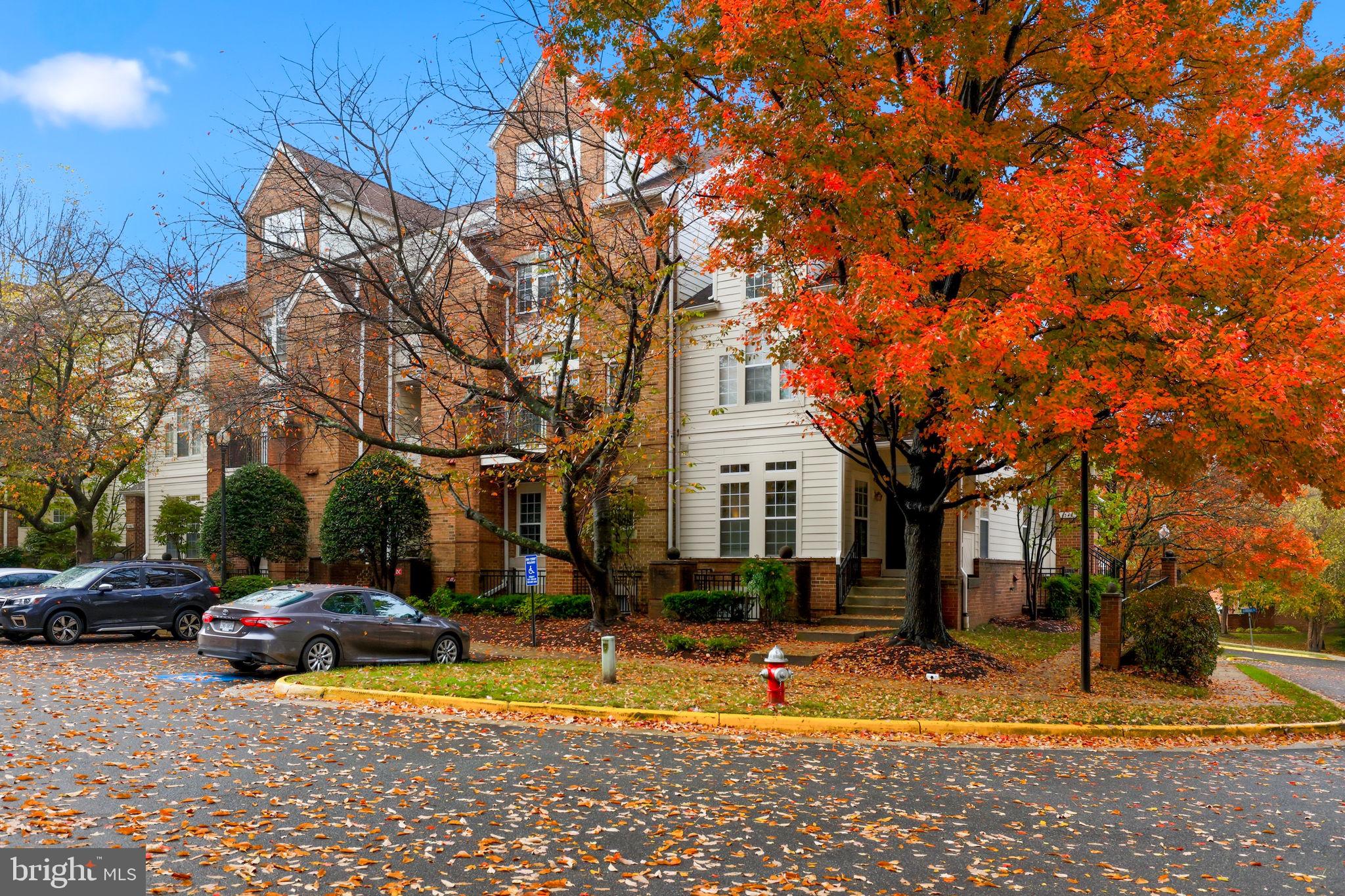 1340 Garden Wall Circle, Unit 502 Reston, VA 20194 - Photo 2 of 32 a view of street with parked cars