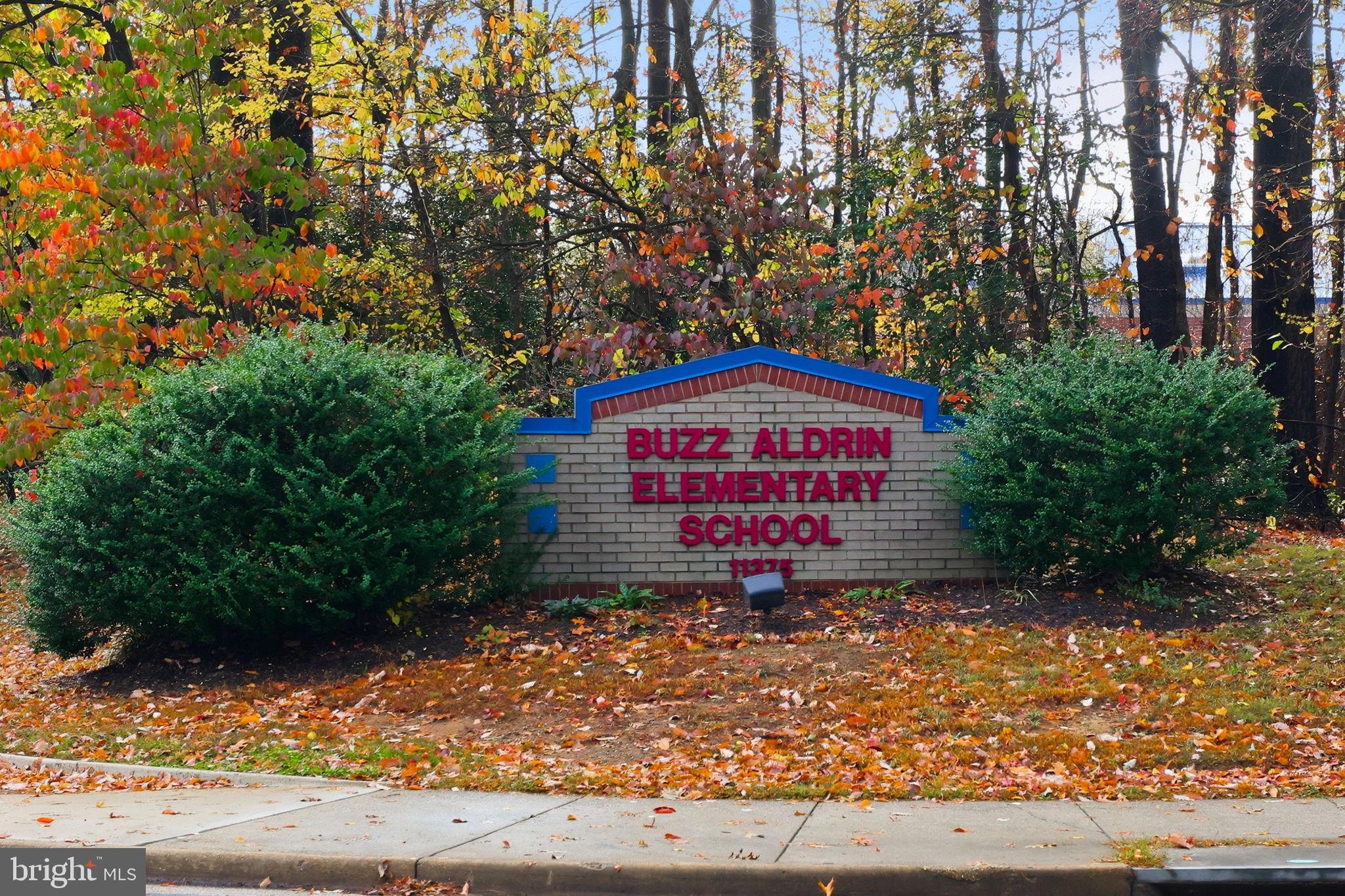 1340 Garden Wall Circle, Unit 502 Reston, VA 20194 - Photo 32 of 32 a sign on the side of a road