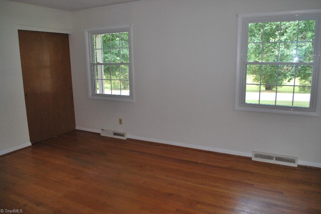 412 Summit Road High Point, NC 27265 - Photo 5 of 10 Living room with hardwood floors.