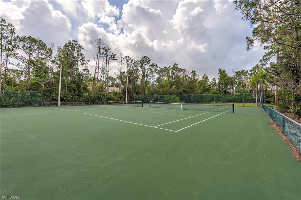 3451 County Barn Road, Unit G204 Naples, FL 34112 - Photo 12 of 12 a view of a tennis court