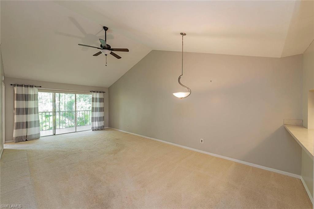 3451 County Barn Road, Unit G204 Naples, FL 34112 - Photo 2 of 12 a view of an empty room with a window