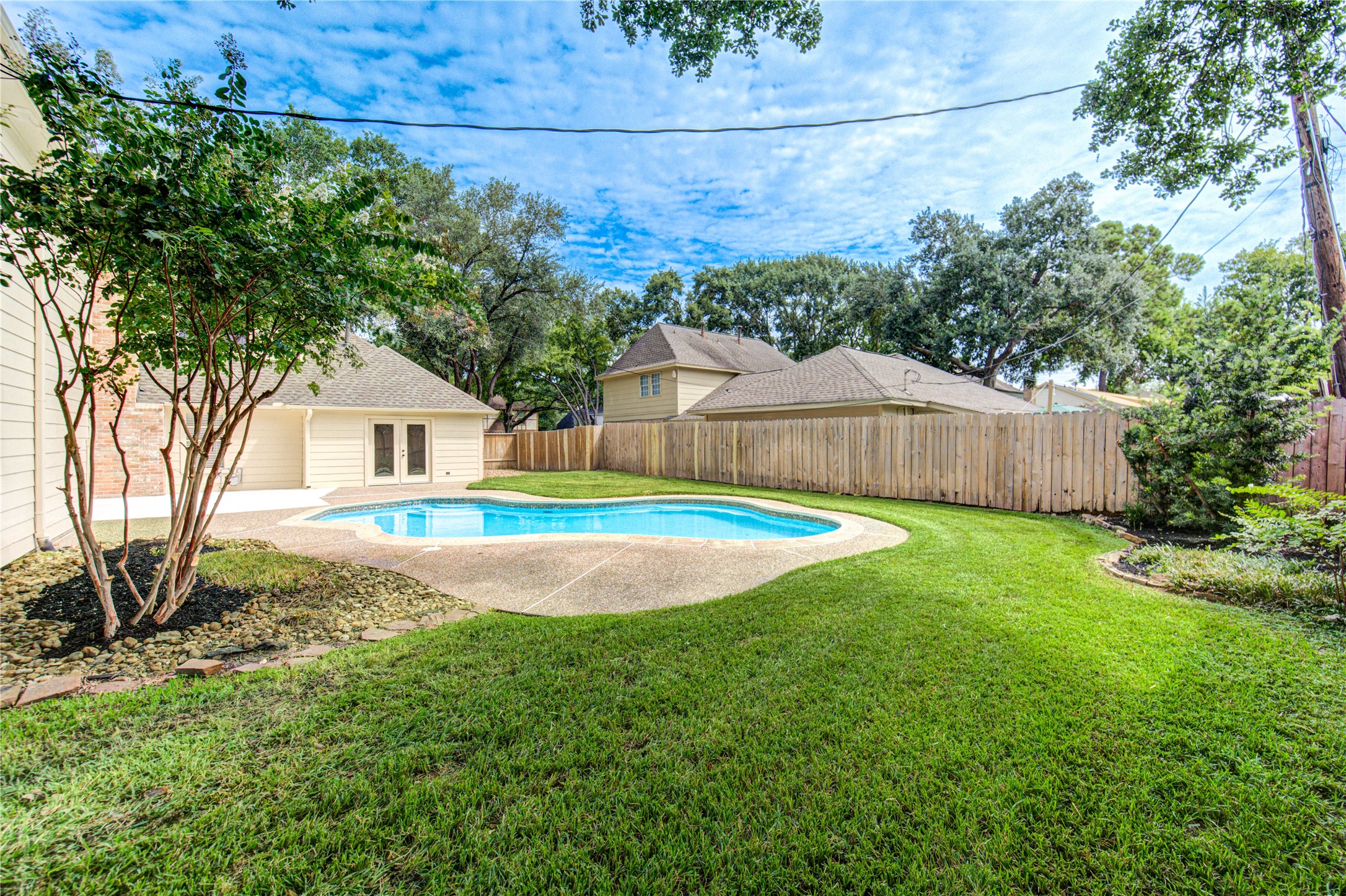 9115 Taidswood Drive Spring, TX 77379 - Photo 39 of 45 Another view of the back yard. This home is in pristine condition and move-in ready!