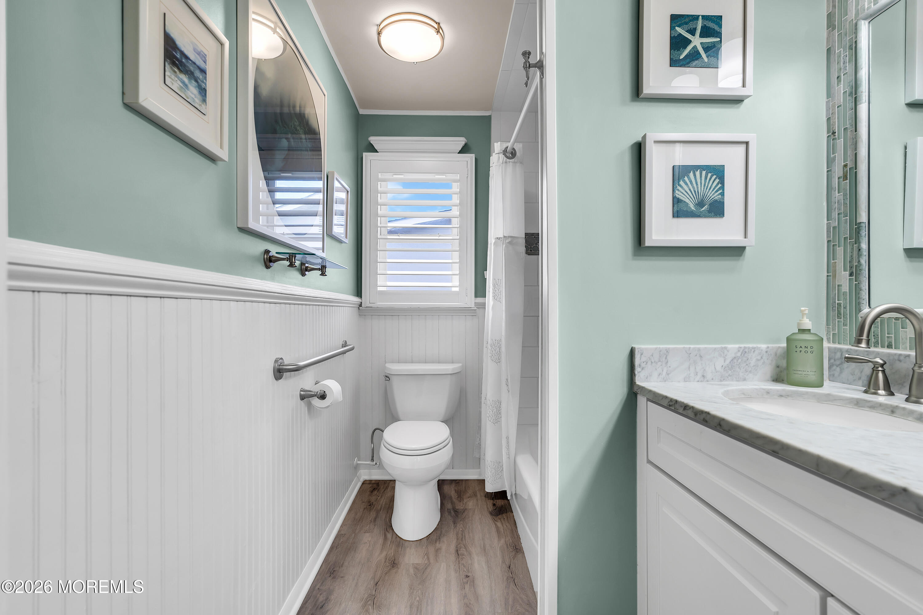 100 Baser Lane Brick, NJ 08724 - Photo 19 of 25 Bathroom w/ Wainscoting & Marble Counter