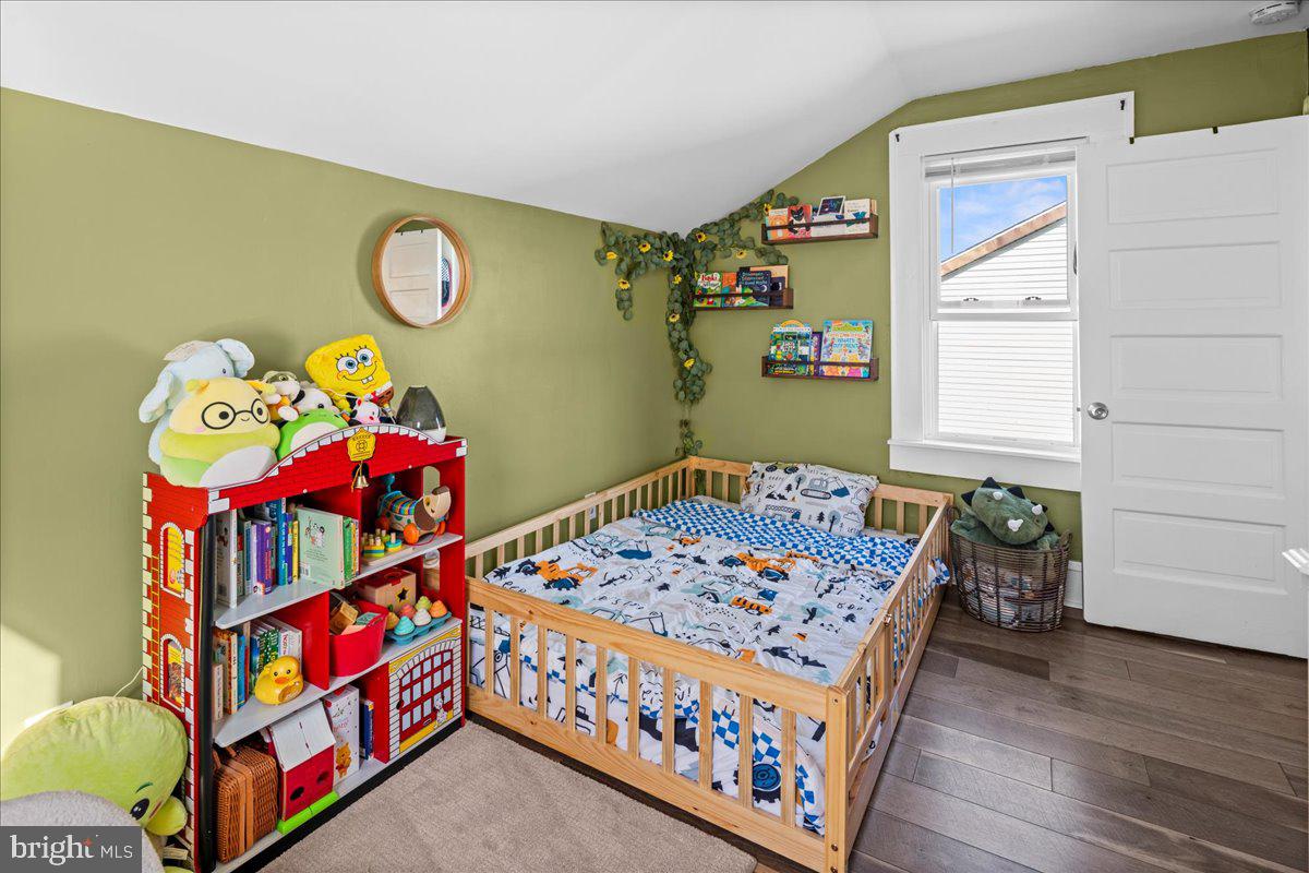 48 Homestead Avenue Ewing, NJ 08638 - Photo 11 of 21 a bedroom with a bed and a window