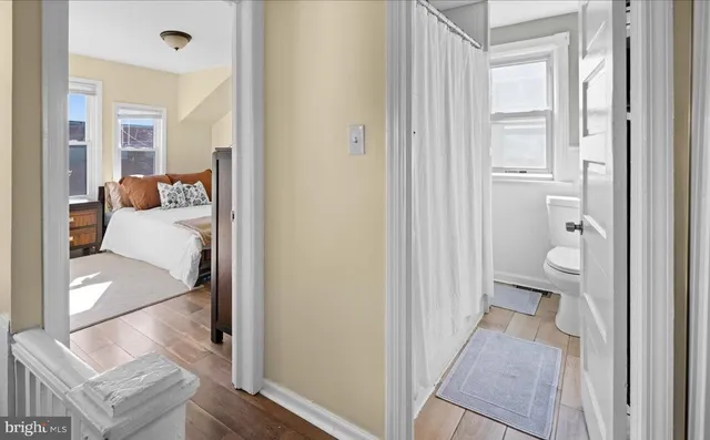 a view of a bathroom from the hallway