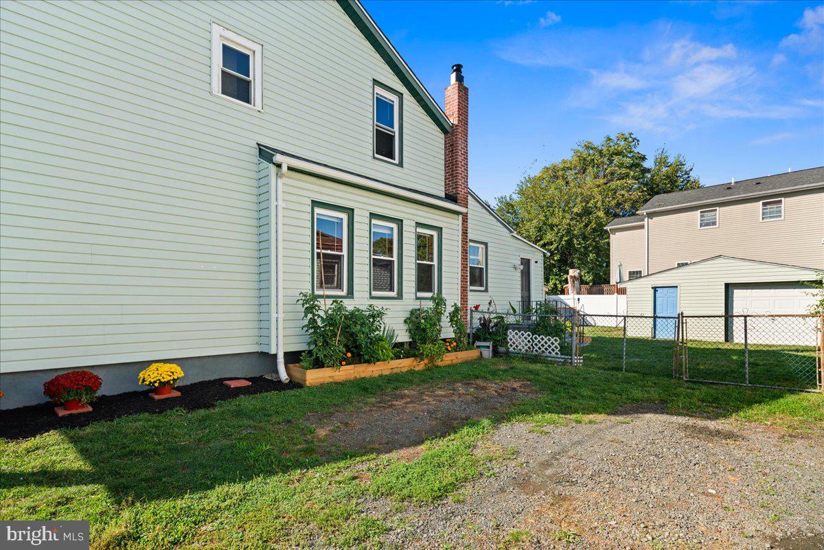 48 Homestead Avenue Ewing, NJ 08638 - Photo 20 of 21 a front view of a house with garden