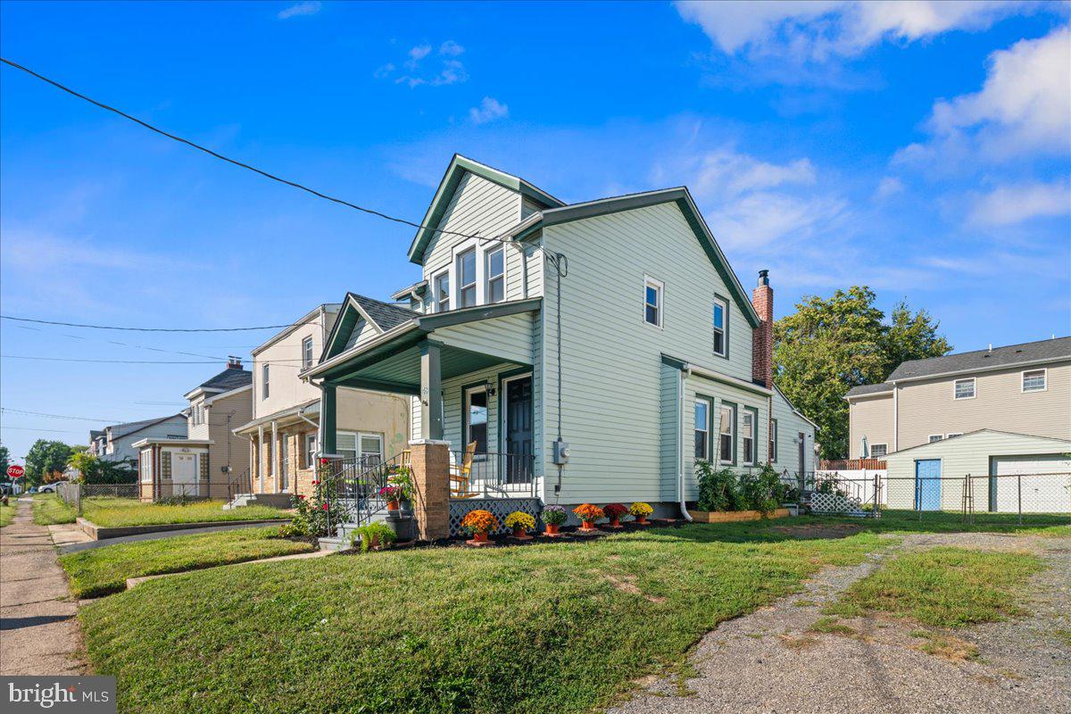 48 Homestead Avenue Ewing, NJ 08638 - Photo 21 of 21 a front view of a house with a garden