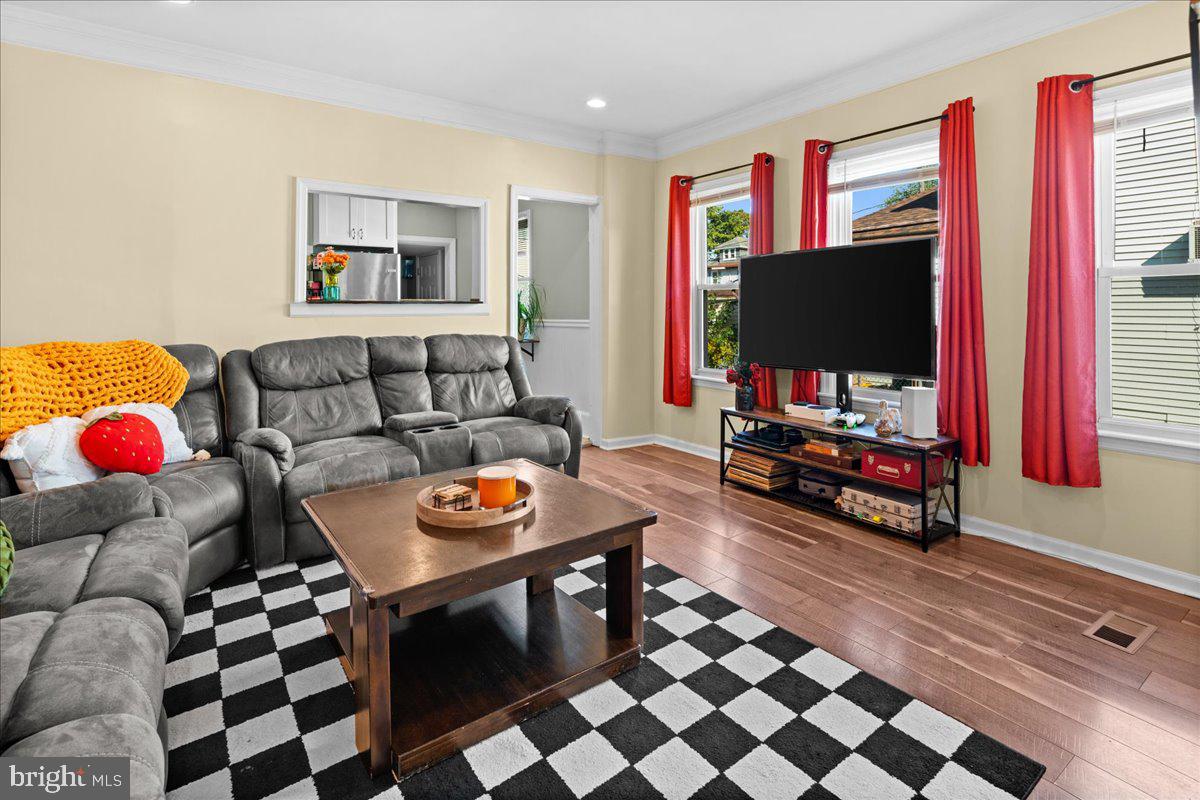 48 Homestead Avenue Ewing, NJ 08638 - Photo 5 of 21 a living room with furniture and a flat screen tv