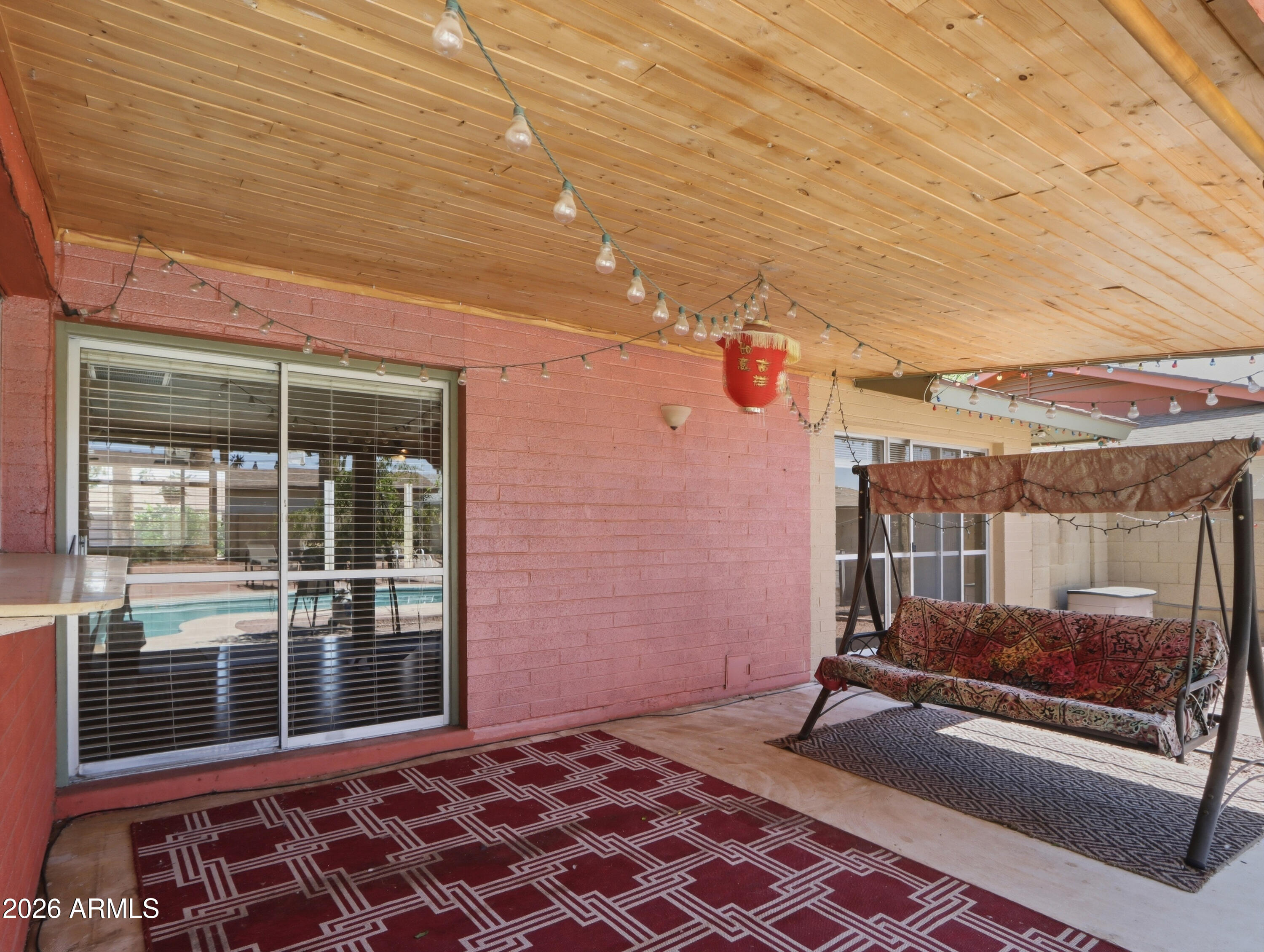 450 Cascada Road Litchfield Park, AZ 85340 - Photo 30 of 40 a backyard of a house with sofas