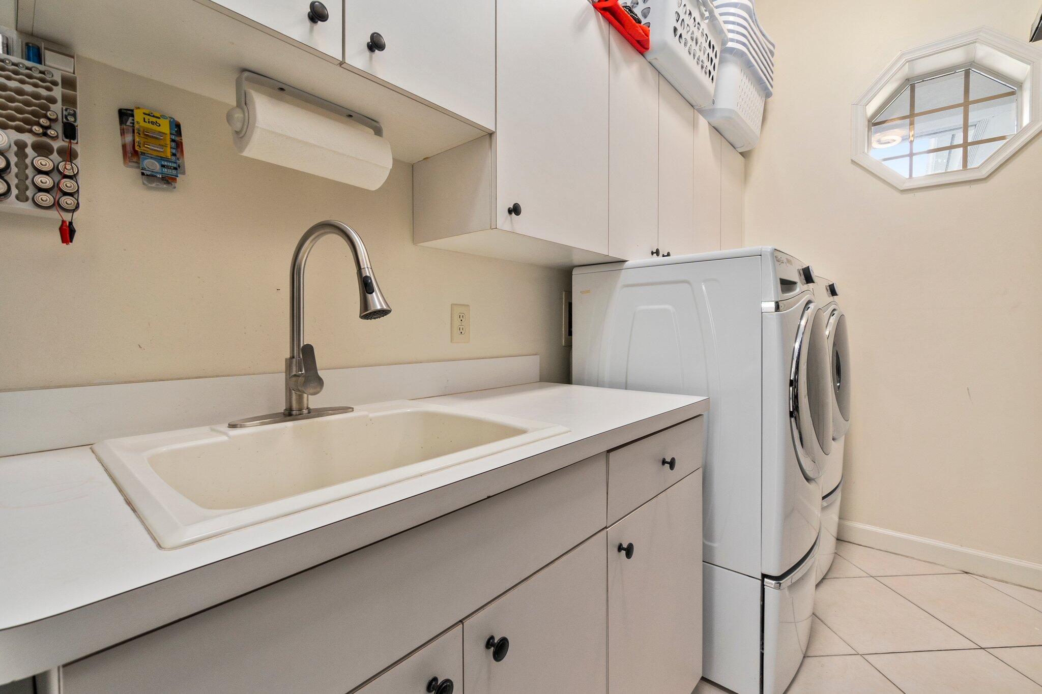 3986 Southwest Rivers End Way Palm City, FL 34990 - Photo 29 of 63 Main Level Laundry