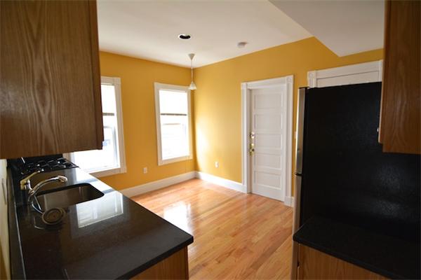 104 King Street, Unit 2 Boston, MA 02122 - Photo 14 of 29 a bedroom with a bed and a window