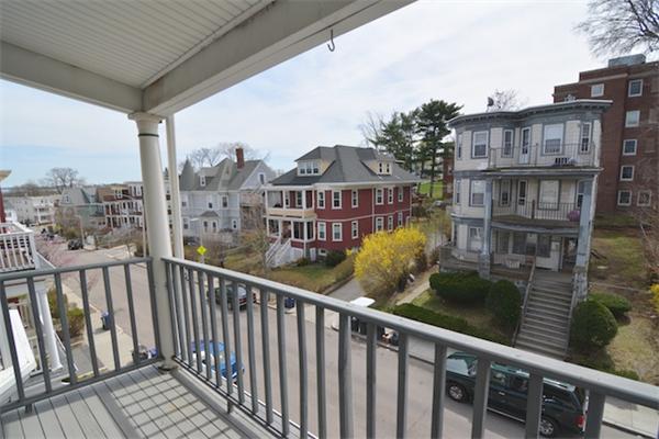 104 King Street, Unit 2 Boston, MA 02122 - Photo 25 of 29 a view of a street from a balcony