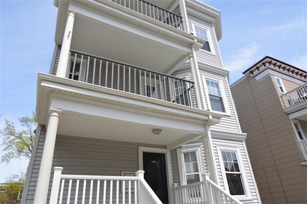 104 King Street, Unit 2 Boston, MA 02122 - Photo 27 of 29 a view of a house with a balcony