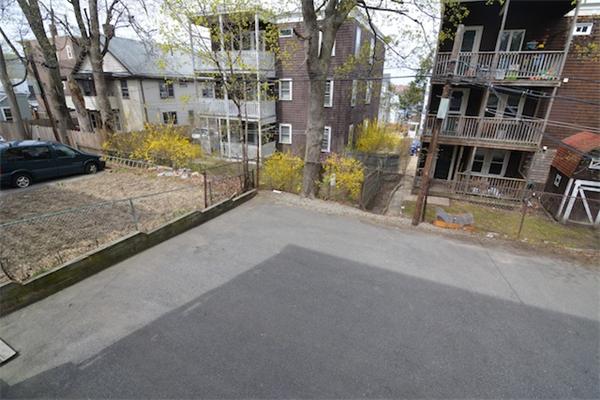 104 King Street, Unit 2 Boston, MA 02122 - Photo 28 of 29 a view of a street with buildings