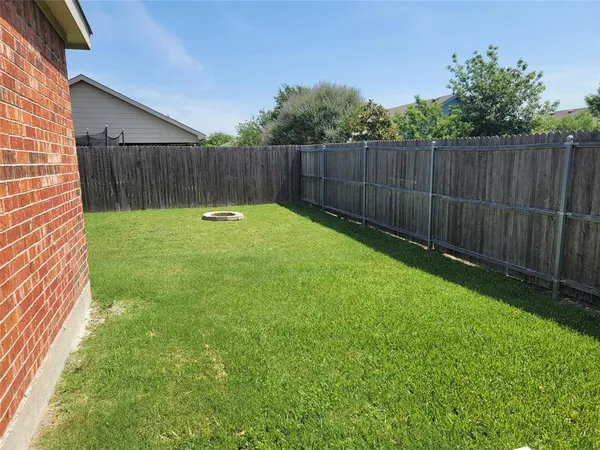 a view of a backyard with a garden