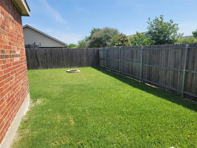 a view of a backyard with a garden