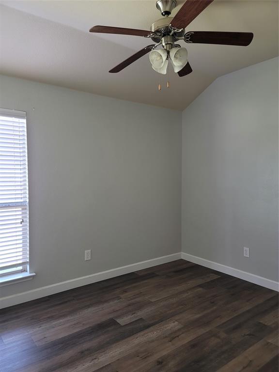 121 Chalk Road Anna, TX 75409 - Photo 8 of 22 a view of a room with wooden floor and ceiling fan
