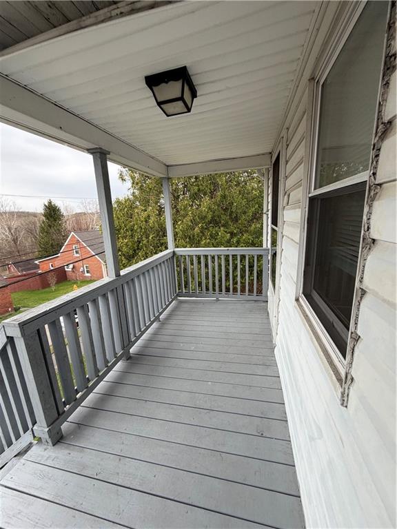 20 North Pine Street Ellsworth, PA 15314 - Photo 2 of 7 a view of balcony with wooden floor