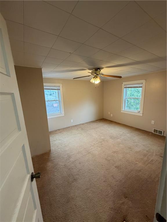 20 North Pine Street Ellsworth, PA 15314 - Photo 3 of 7 an empty room with windows and closet