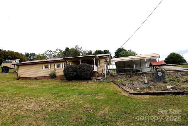 a view of a house with swimming pool