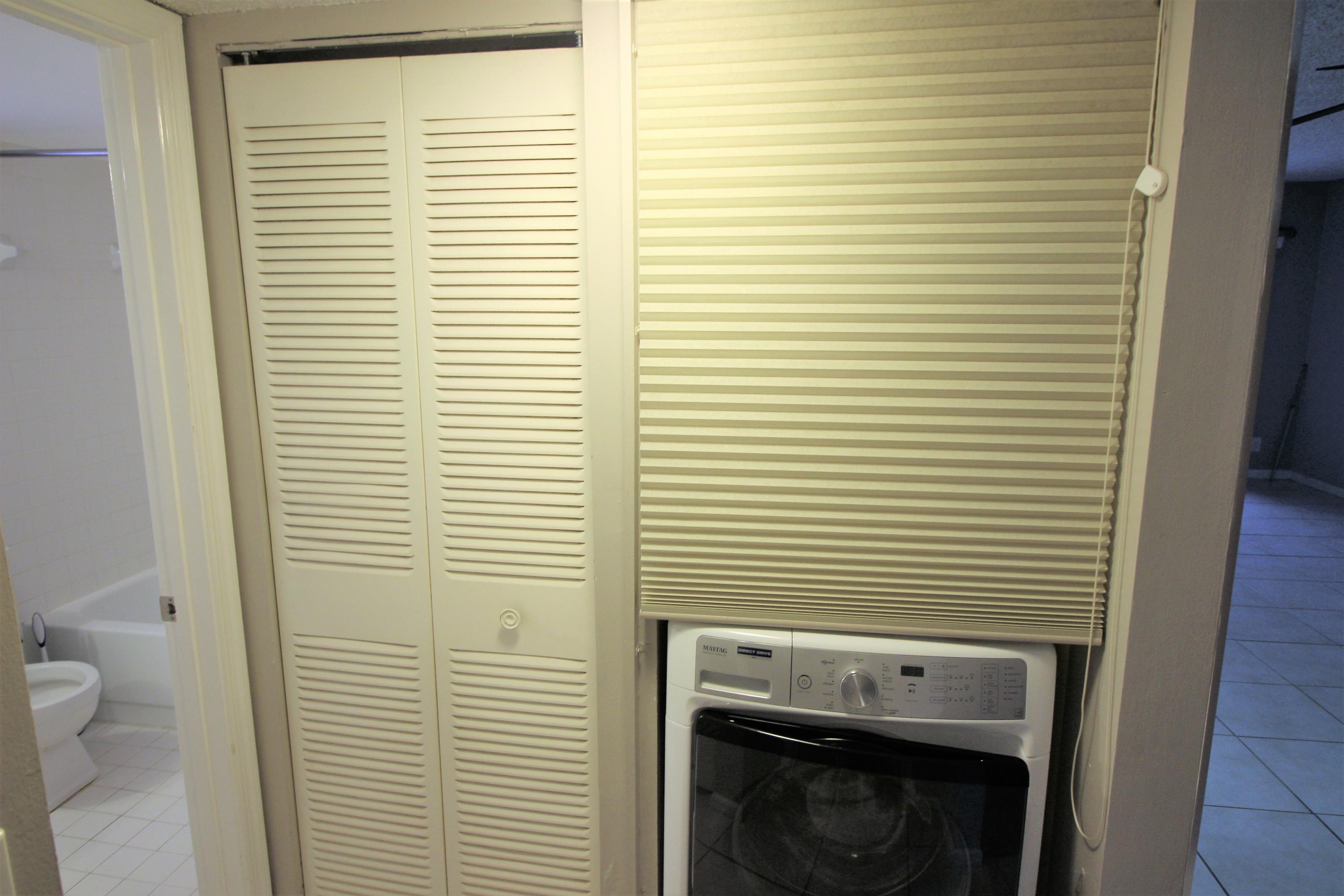 2600 Greenwood Terrace, Unit G101 Boca Raton, FL 33431 - Photo 23 of 28 laundry closet