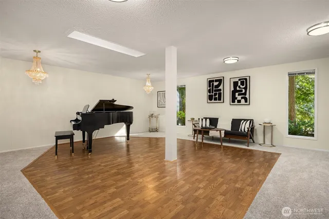 a living room with furniture and a table