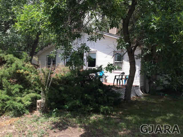 571 29 Road Grand Junction, CO 81501 - Photo 2 of 19 a view of a house with backyard and garden
