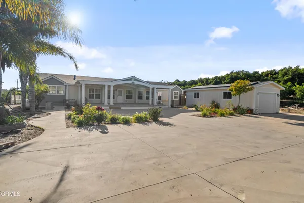 a view of a house with a patio