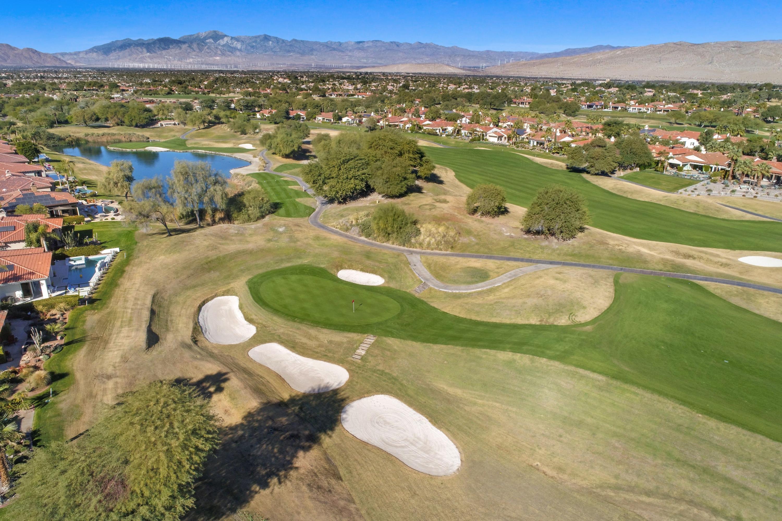 122 Loch Lomond Road Rancho Mirage, CA 92270 - Photo 3 of 34 a view of a water pond with city view