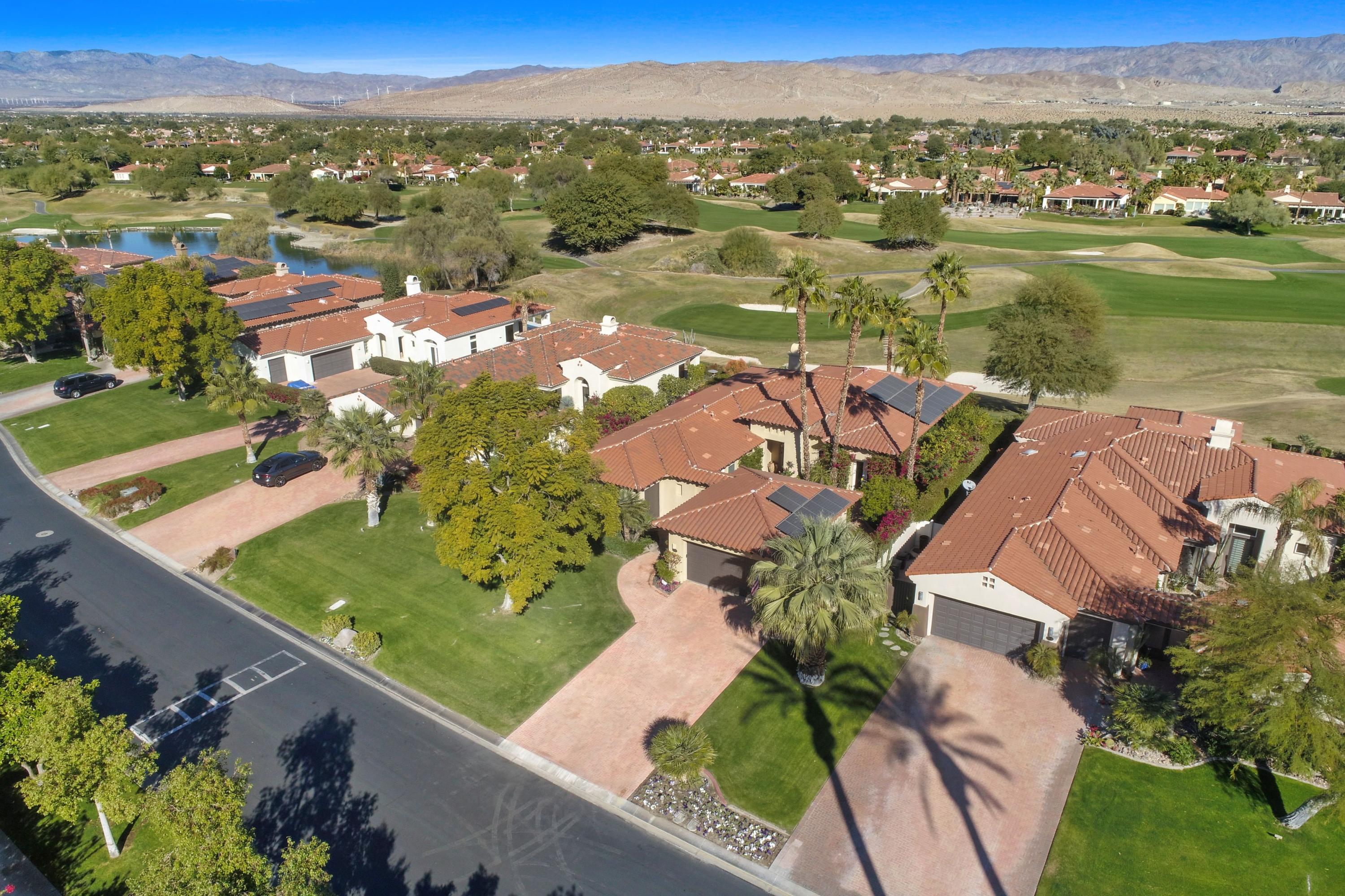 122 Loch Lomond Road Rancho Mirage, CA 92270 - Photo 27 of 34 an aerial view of a house with a lake view
