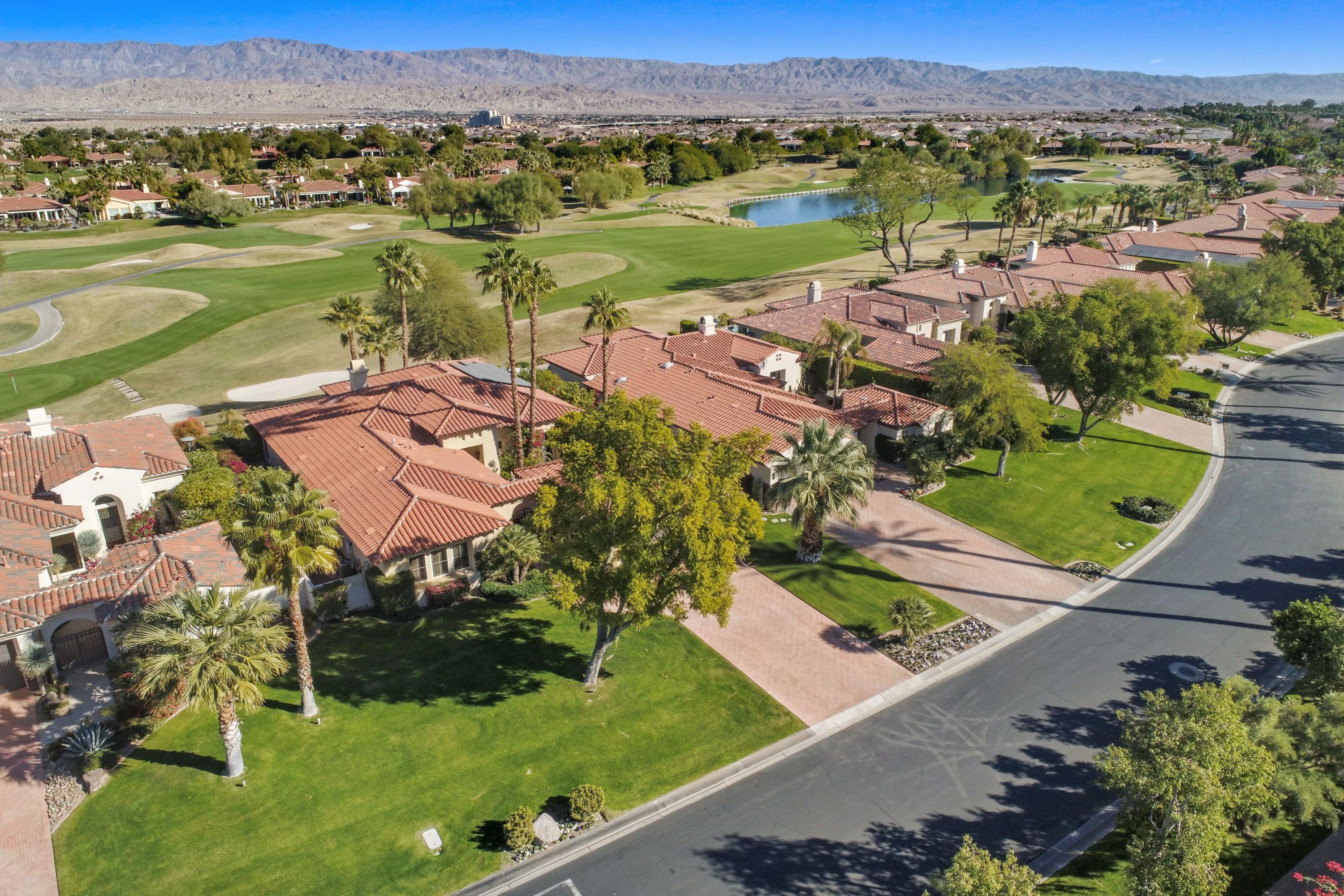 122 Loch Lomond Road Rancho Mirage, CA 92270 - Photo 28 of 34 an aerial view of residential houses with outdoor space and river