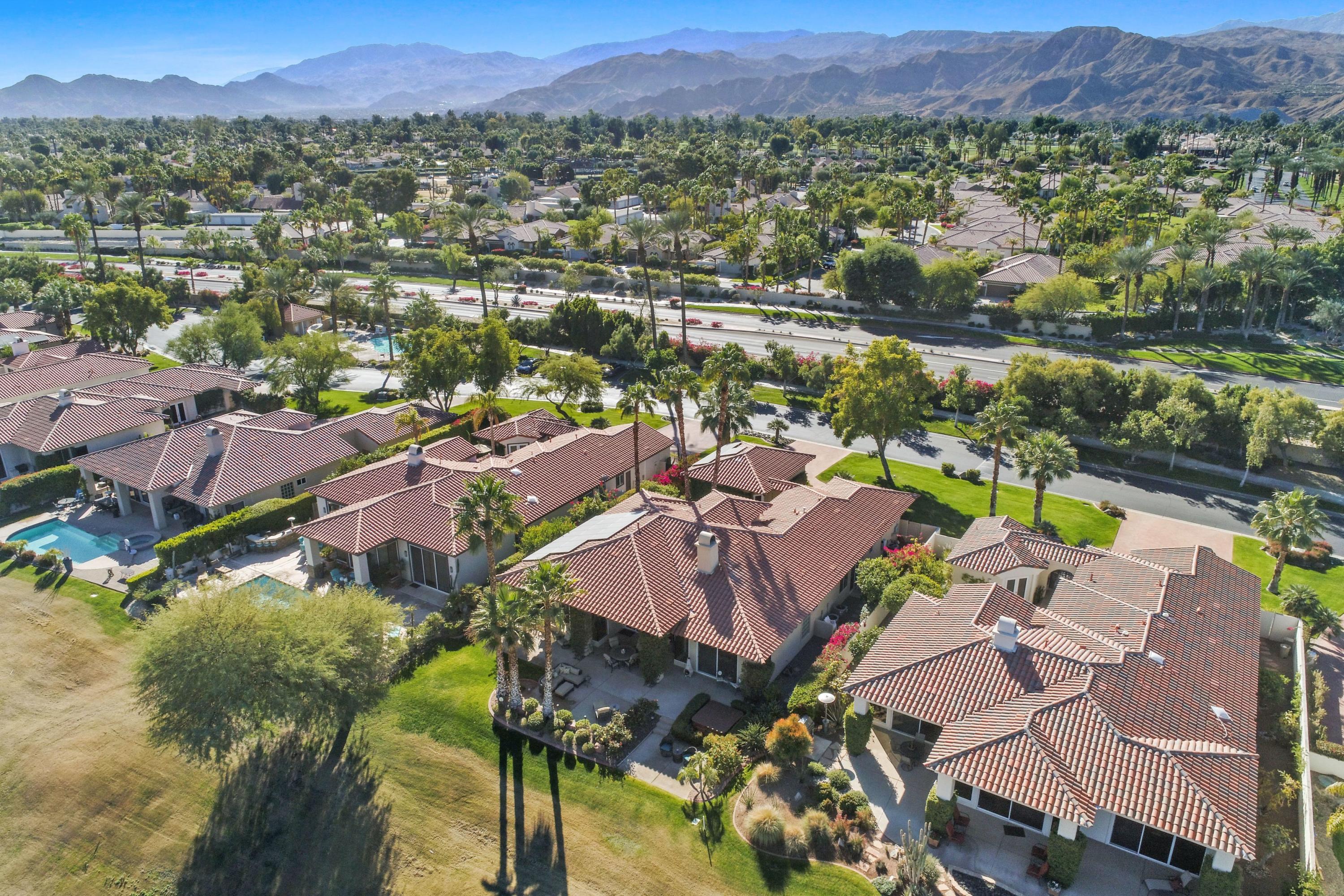 122 Loch Lomond Road Rancho Mirage, CA 92270 - Photo 30 of 34 an aerial view of residential houses with outdoor space and river