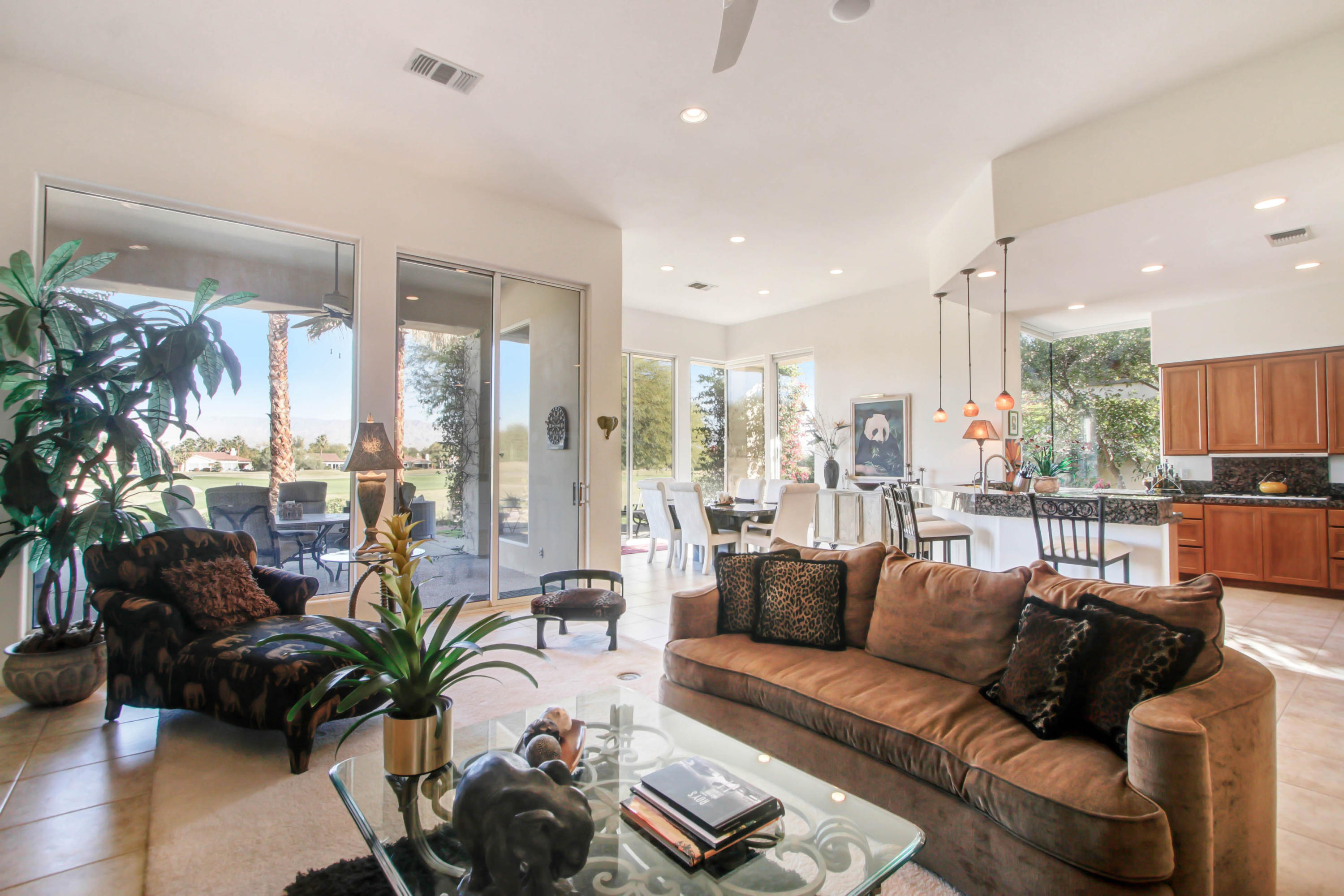 122 Loch Lomond Road Rancho Mirage, CA 92270 - Photo 7 of 34 a living room with furniture and a large window