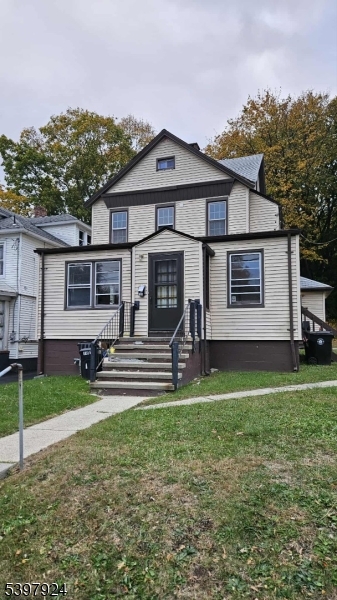 16 Main Street, Unit A Netcong, NJ 07857 - Photo 1 of 12 a front view of a house with a yard and garage