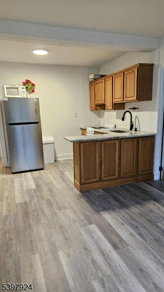 16 Main Street, Unit A Netcong, NJ 07857 - Photo 2 of 12 a view of a kitchen with stainless steel appliances granite countertop a sink and a stove