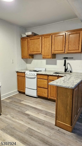 16 Main Street, Unit A Netcong, NJ 07857 - Photo 3 of 12 a kitchen with stainless steel appliances granite countertop a sink stove and cabinets